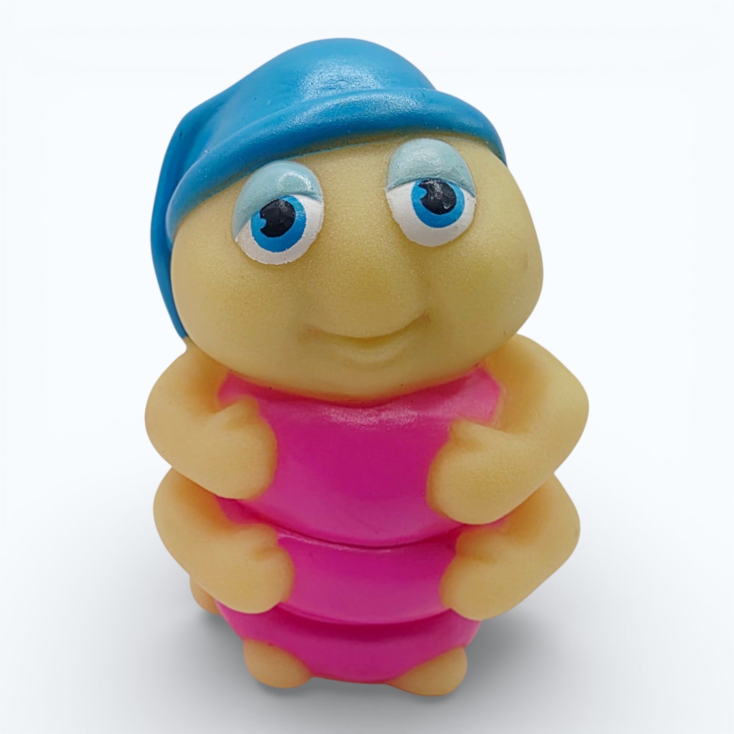 Vintage 1980s mini pvc figure. Glo Snugbug. 3". Front view.