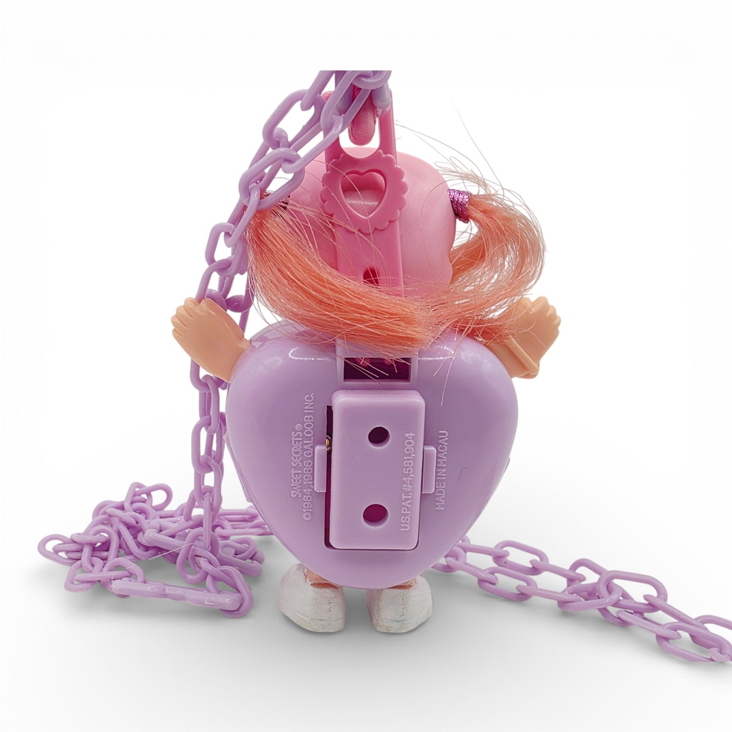 Vintage 1980s small toy. Series 3. Curli Heart. Complete with Necklace Clip!. Back view.