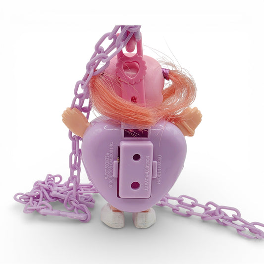 Vintage 1980s small toy. Series 3. Curli Heart. Complete with Necklace Clip!. Back view.