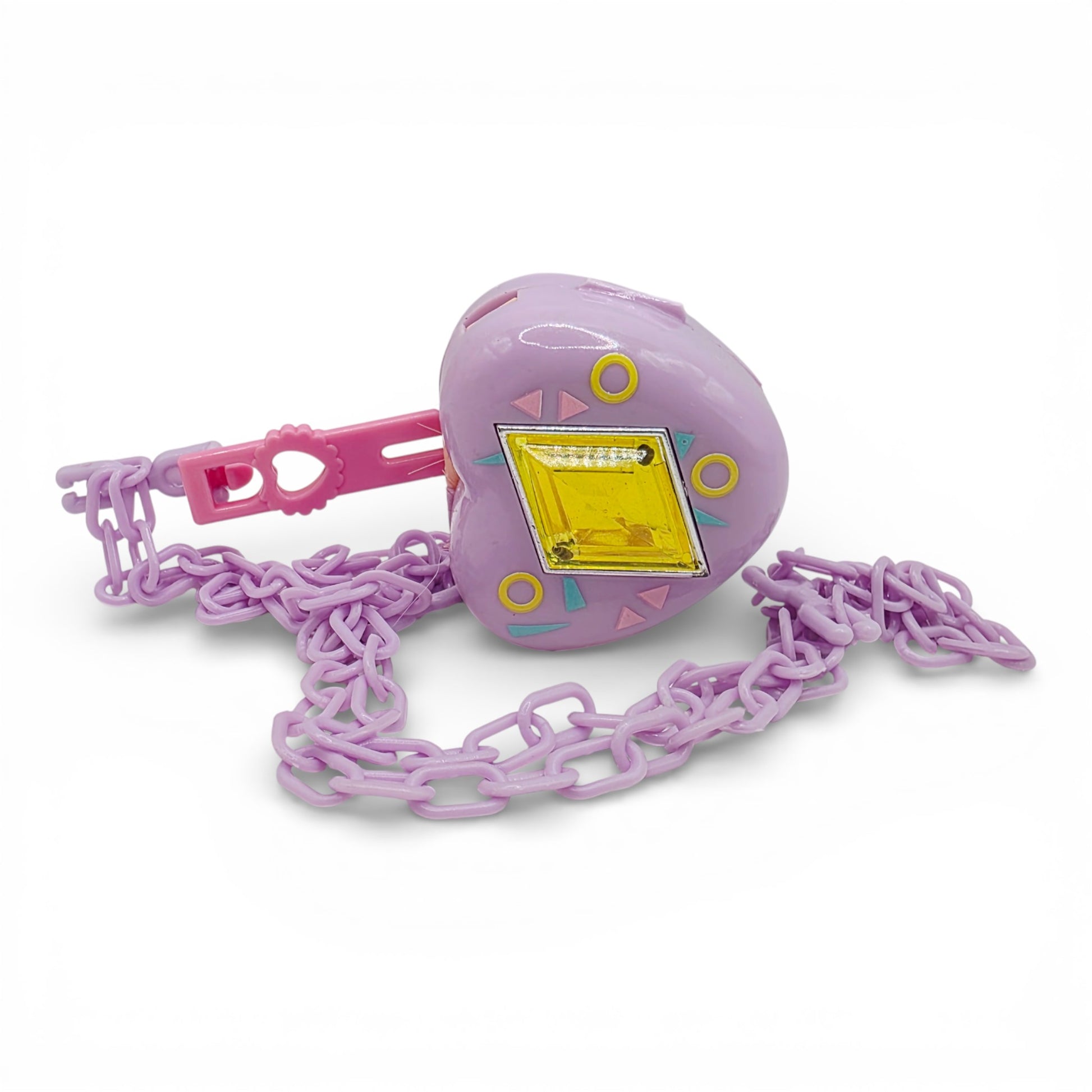 Vintage 1980s small toy. Series 3. Curli Heart. Complete with Necklace Clip!. Face view.