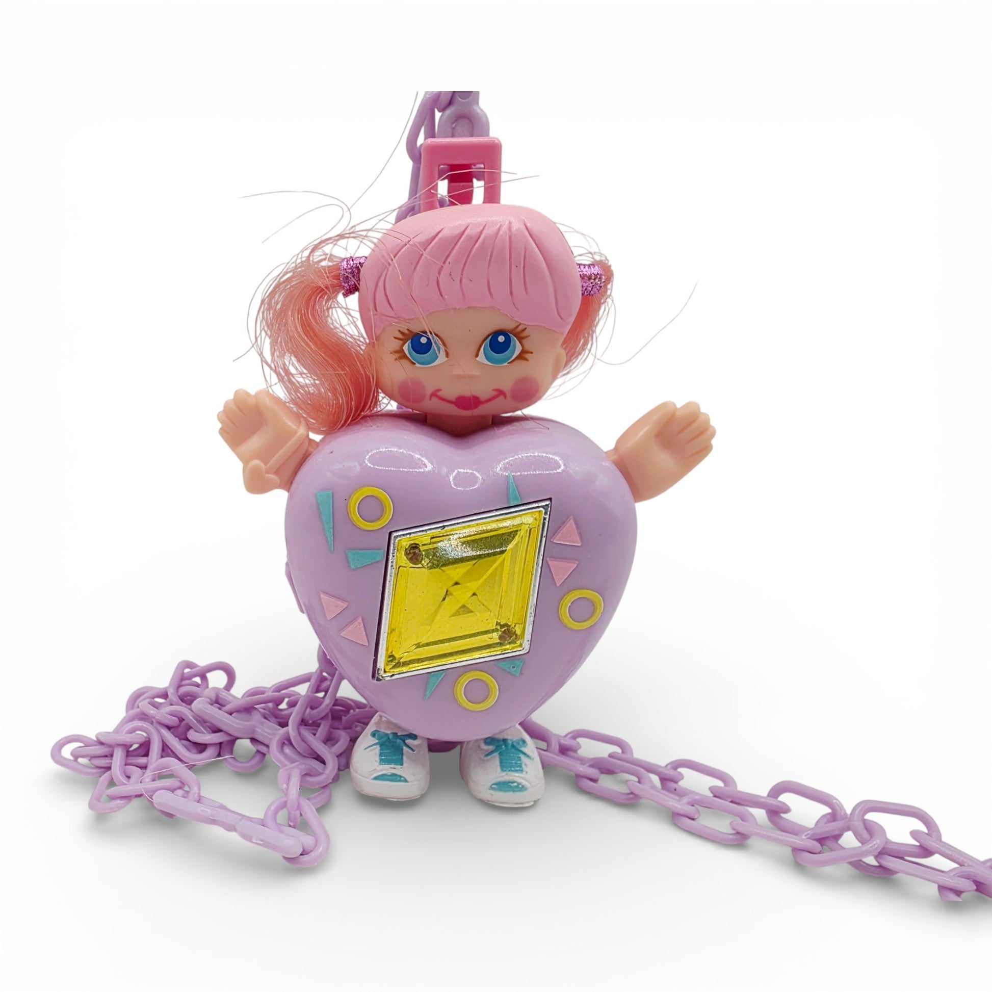 Vintage 1980s small toy. Series 3. Curli Heart. Complete with Necklace Clip!. Front view.