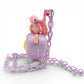 Vintage 1980s small toy. Series 3. Curli Heart. Complete with Necklace Clip!. Left view.