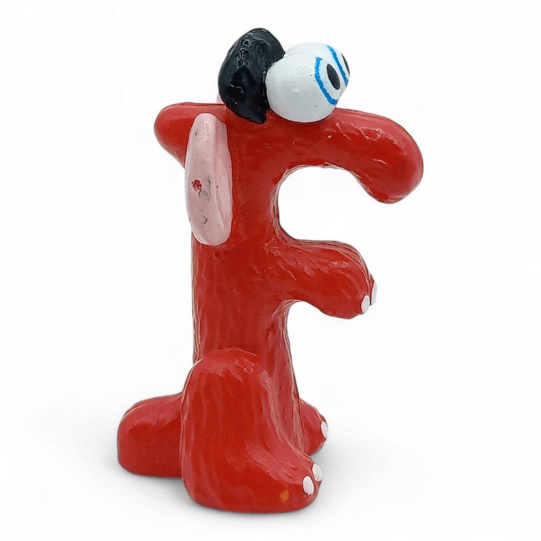 Vintage 1980s mini pvc figure. Fuzzle. 2" Mini Figure. Front view.