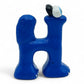 Vintage 1980s mini pvc figure. Herkin. 2" Mini Figure. Left view.