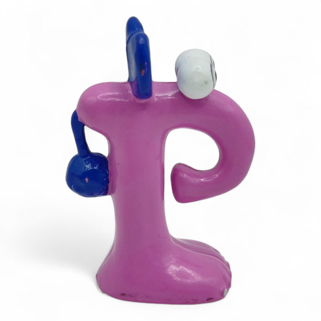 Vintage 1980s mini pvc figure. Puphin. 2" Mini Figure. Front view.