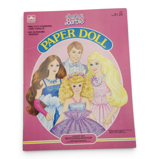 Vintage 1980s paper doll book. Vintage Paper Doll Book. Jewel Secrets. Front view.