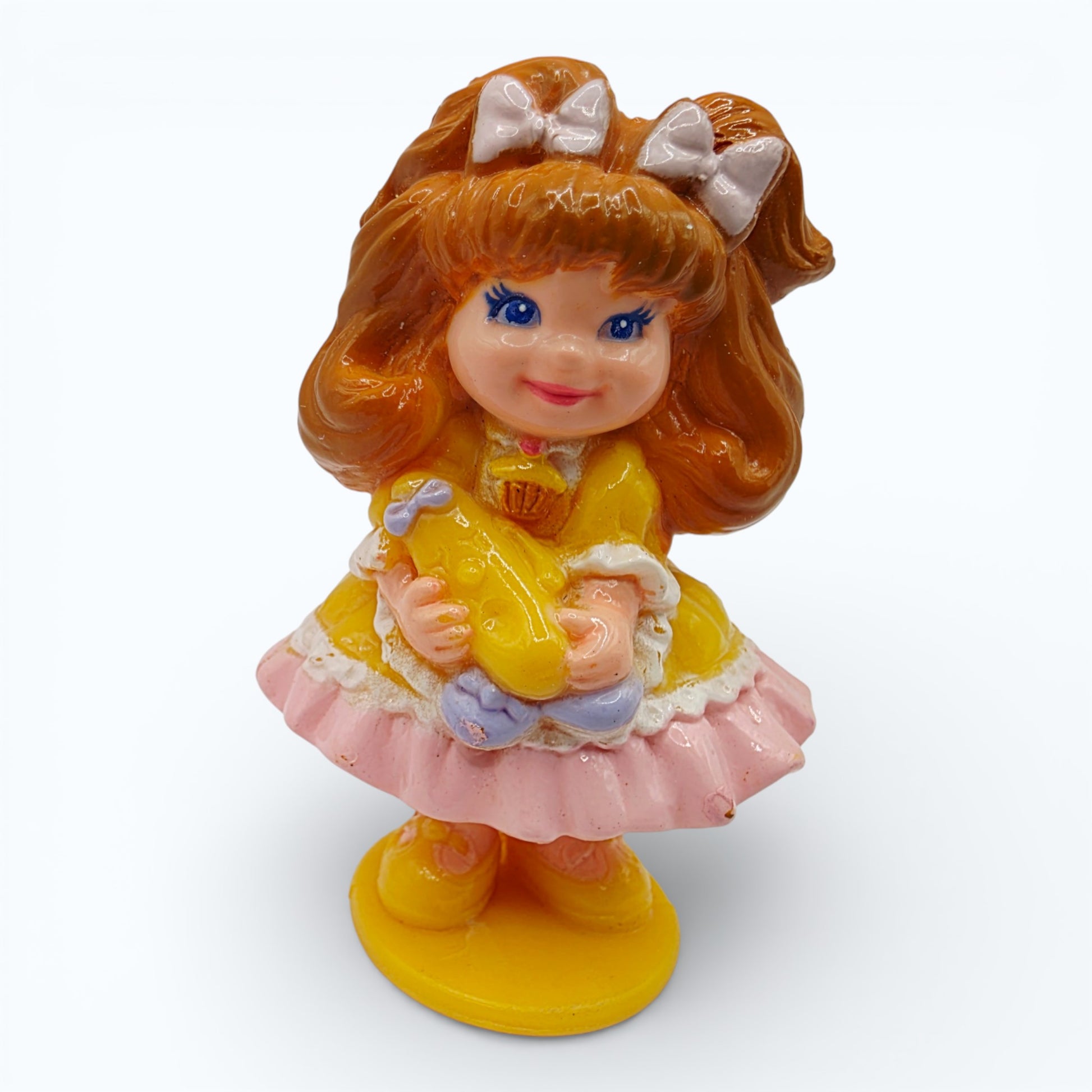 Vintage 1980s mini pvc figure. Series 1 Miniatures. Banancy. 2.5". Front view.