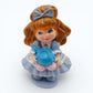 Vintage 1980s mini pvc figure. Series 1 Miniatures. Betty Berry. 2.5". Front view.