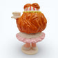 Vintage 1980s mini pvc figure. Series 2 Miniatures. Penny Peppermint. 2.5". Back view.