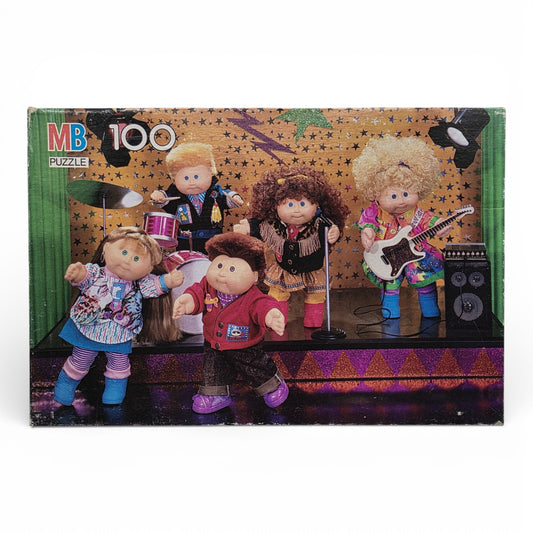 Vintage 1990s puzzles & jigsaws. 100 piece Puzzle. CPK Rocking Out. Front view.