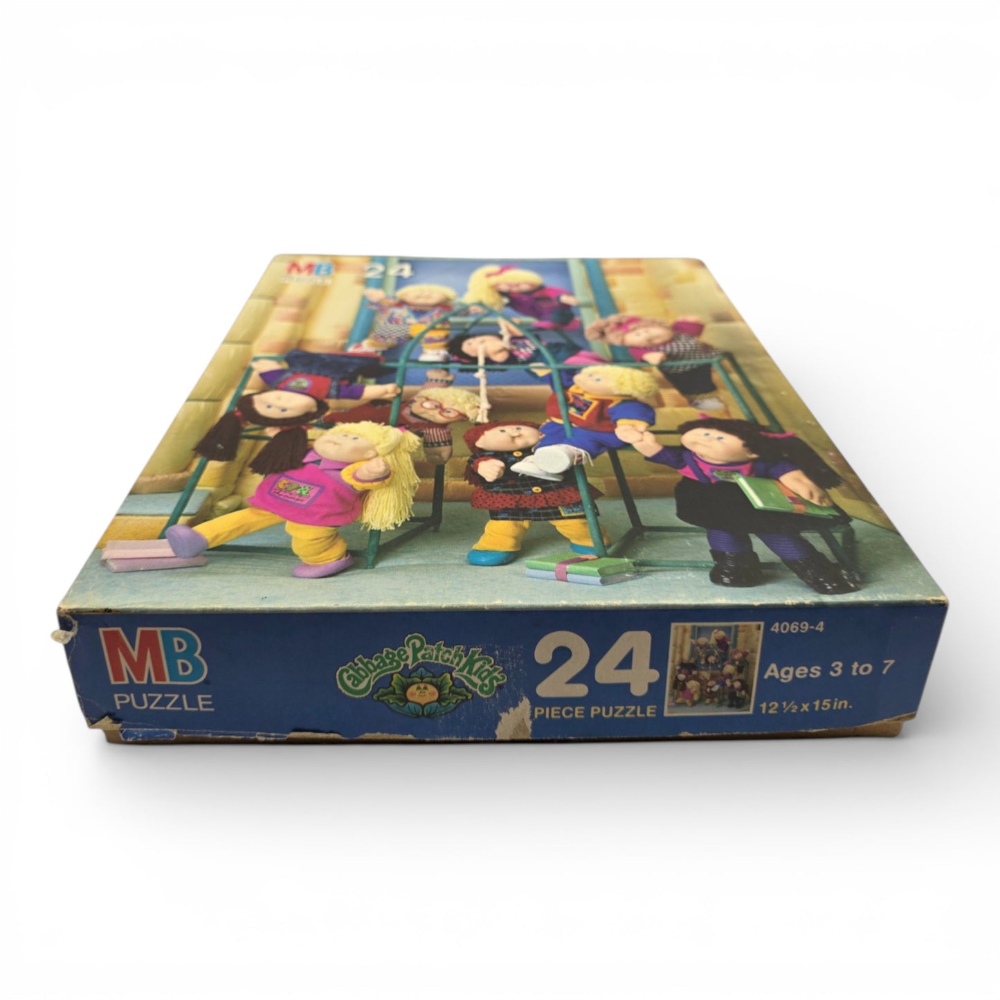 Vintage 1990s puzzles & jigsaws. 24 piece Puzzle. CPK Schoolyard Fun. Close up 1 view.