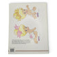 Vintage 1990s paper doll book. Vintage Paper Doll Book. Back view.