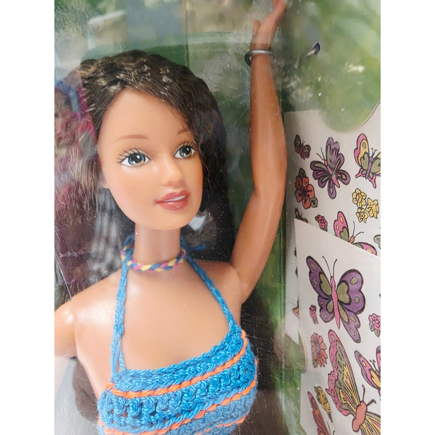 Vintage 1990s doll. Butterfly Art. Teresa. Face view.