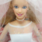 Vintage 1990s doll. Blushing Bride Barbie. Face view.
