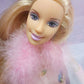 Vintage 2000s doll. Flower Surprise Barbie. Face view.