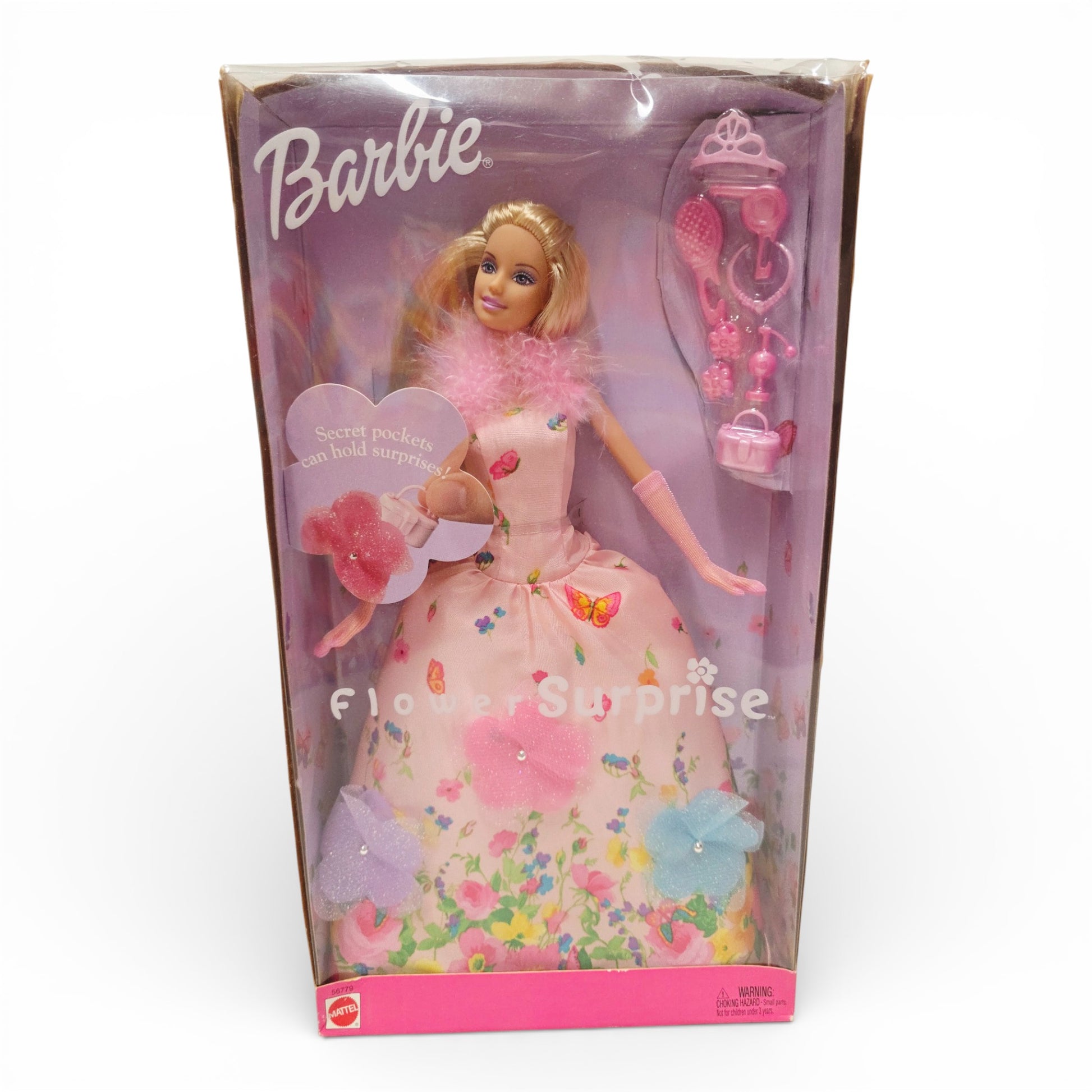 Vintage 2000s doll. Flower Surprise Barbie. Front view.