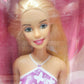 Vintage 2000s doll. Palm Beach Barbie. Face view.
