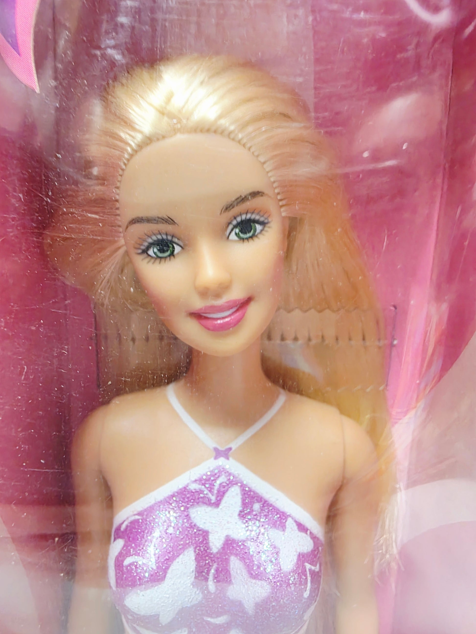 Vintage 2000s doll. Palm Beach Barbie. Face view.