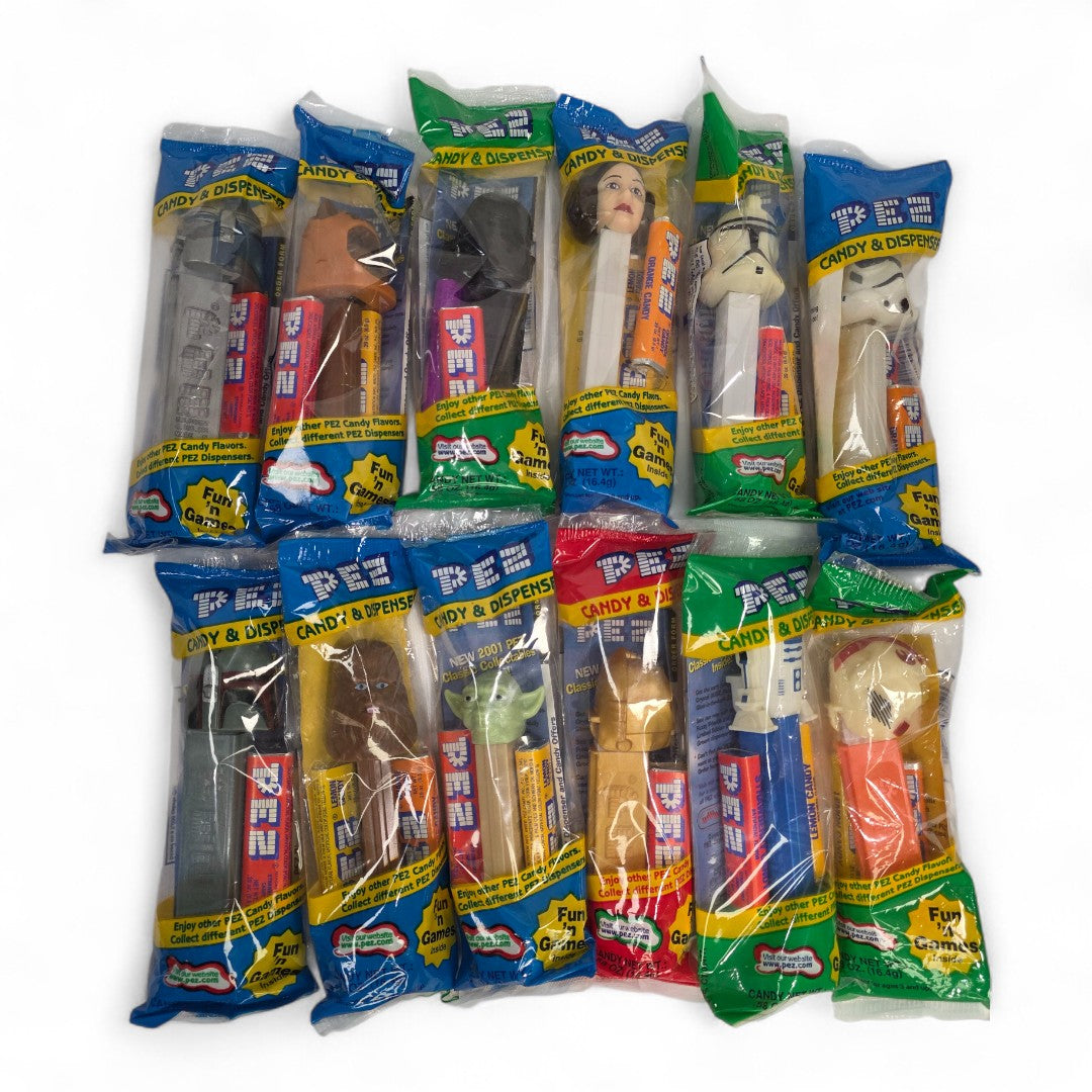 Vintage 2000s small toy. Star Wars Episode II – PEZ Candy Dispenser Box Set. 12 Dispensers!. Close up 1 view.