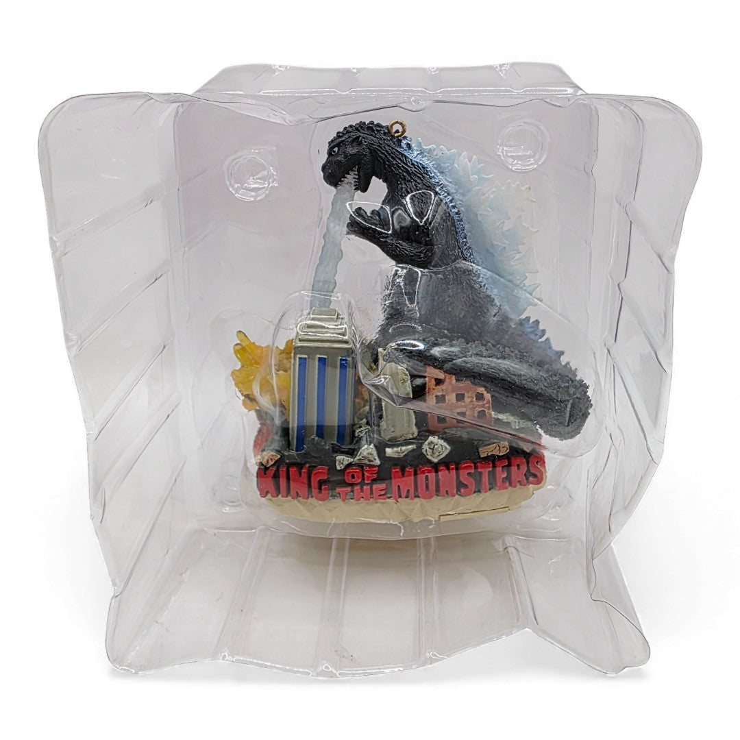 Vintage 2000s action figure accessory. Heirloom Ornament Collection. Godzilla is Coming to Town! Light up Ornament. Close up 1 view.