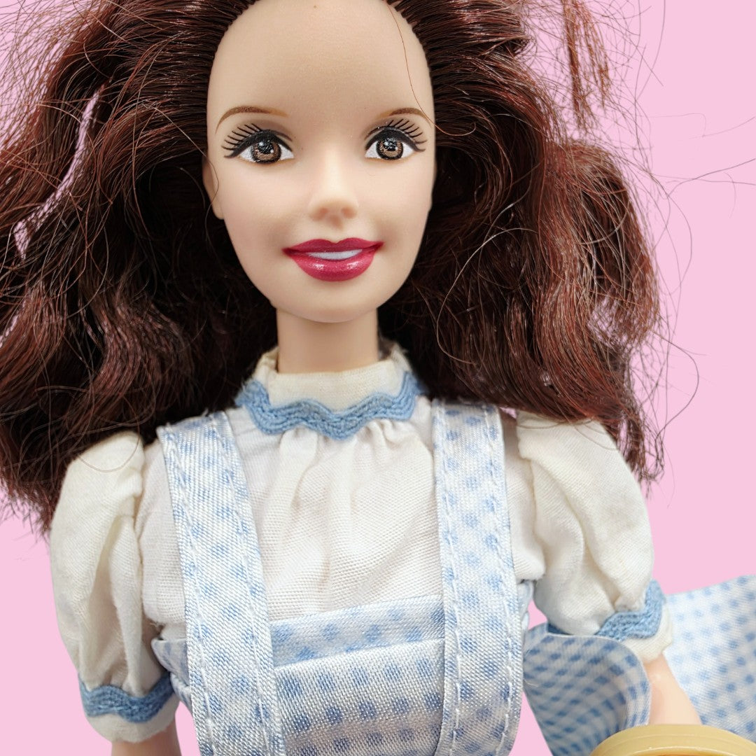 Vintage 2000s doll. Wizard of Oz. Dorothy. Pink Label Barbie. Face view.