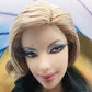 2009 Barbie Black Label Barbie Loves Bond Pussy Galore Face view