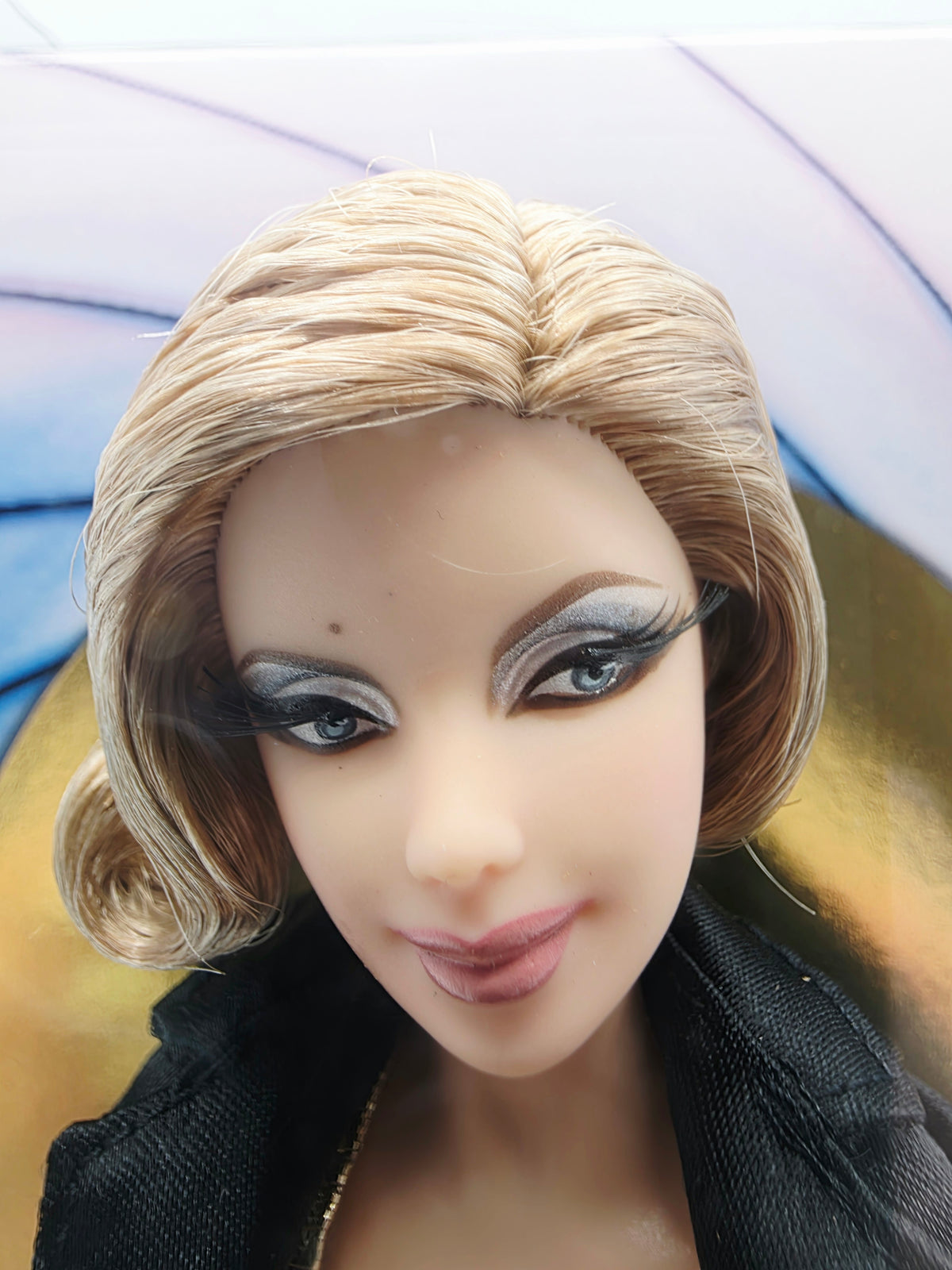 2009 Barbie Black Label Barbie Loves Bond Pussy Galore Face view