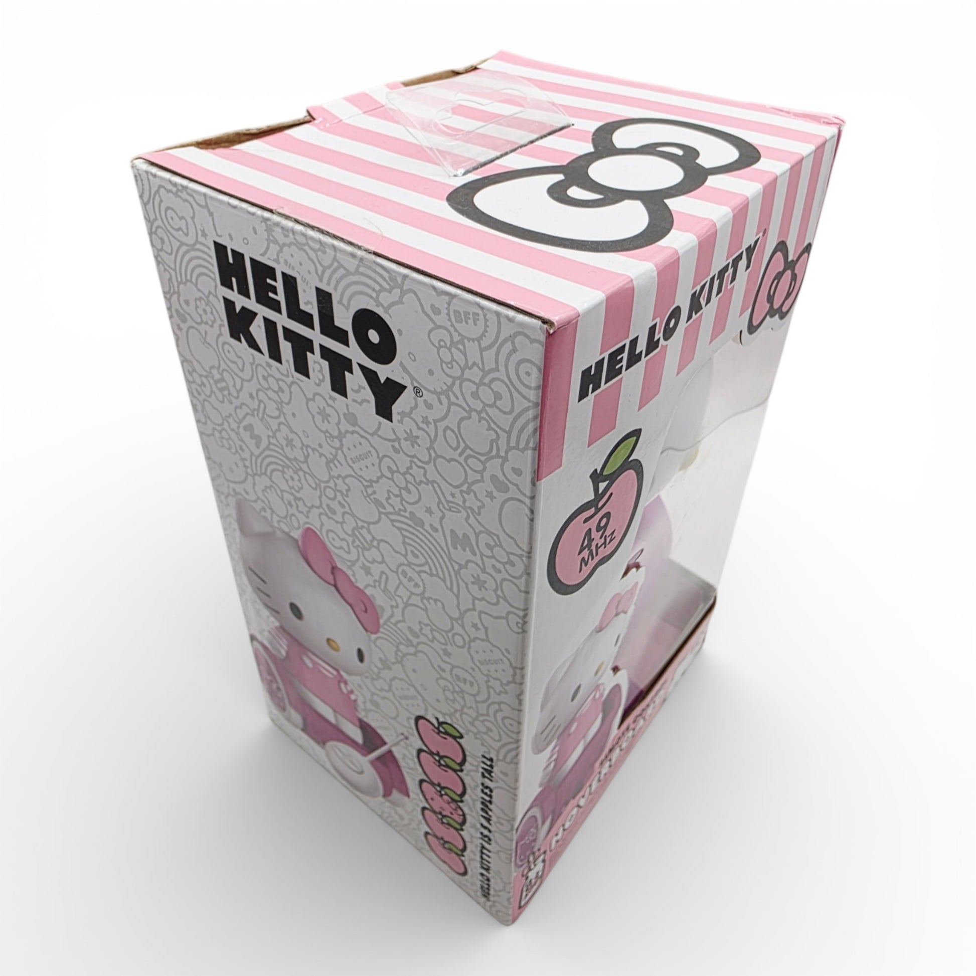 Vintage 2020s small toy. Remote Control Hoverboard. Hello Kitty. Left view.